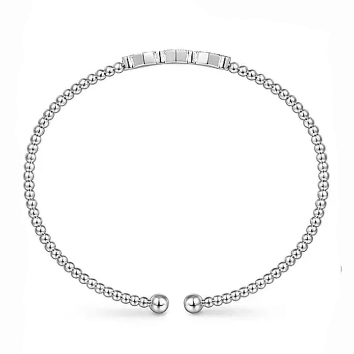 Beaded 14K white gold bangle featuring a hexagon diamond cluster.
