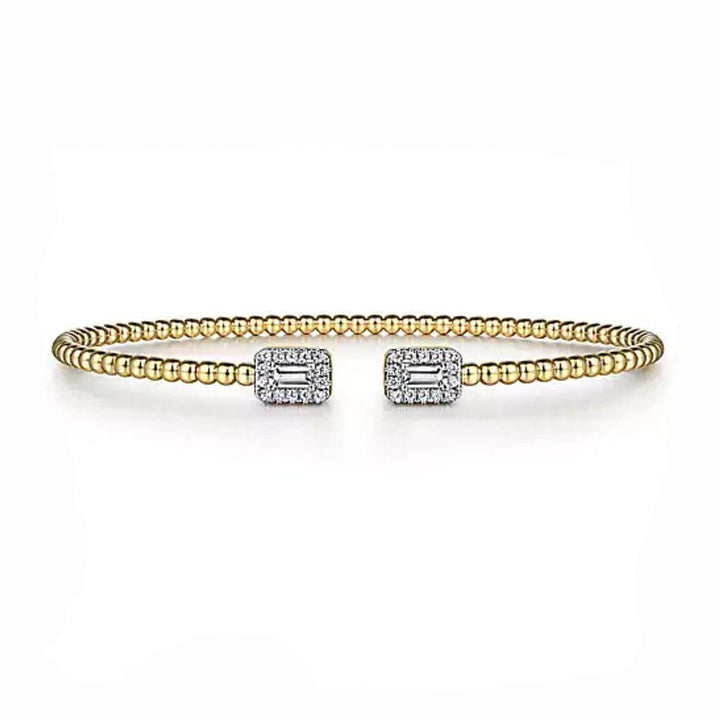 14K gold beaded cuff bracelet featuring baguette diamond accents.