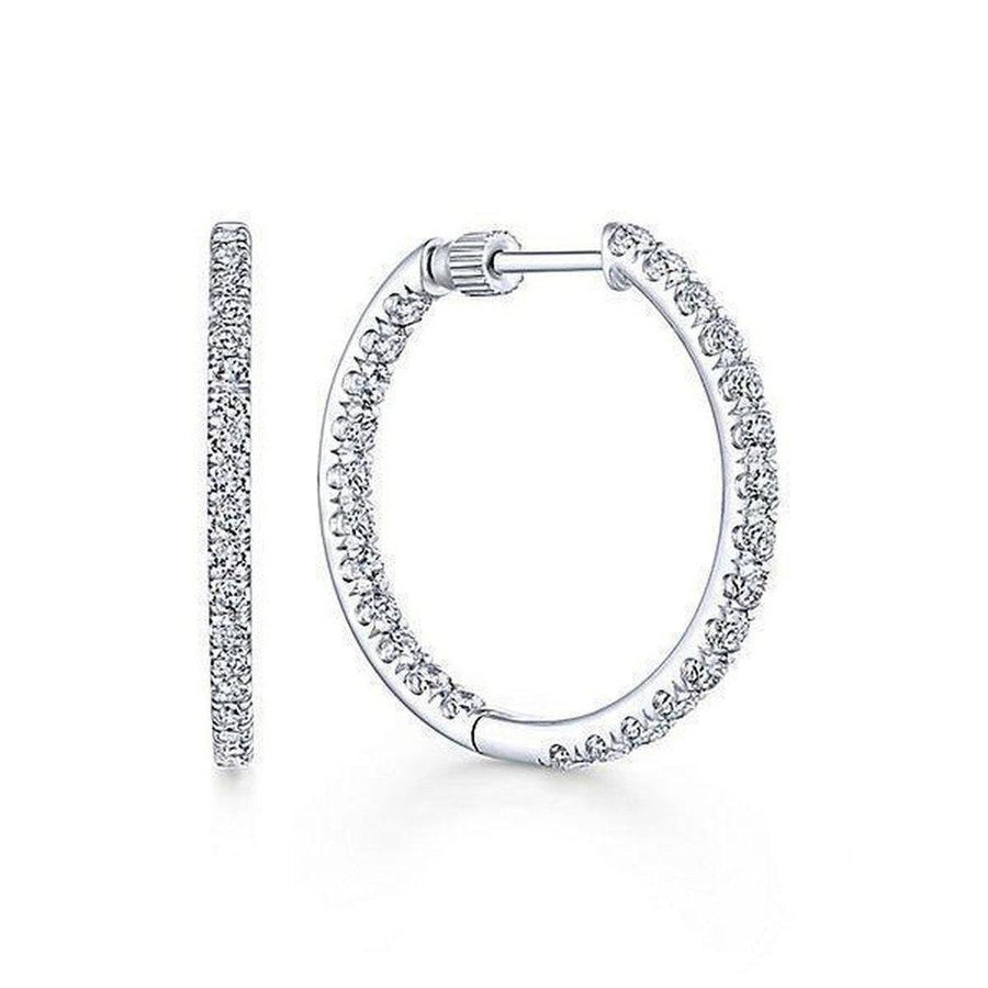 1.2" inside-out diamond hoop earrings; sparkling white gold.