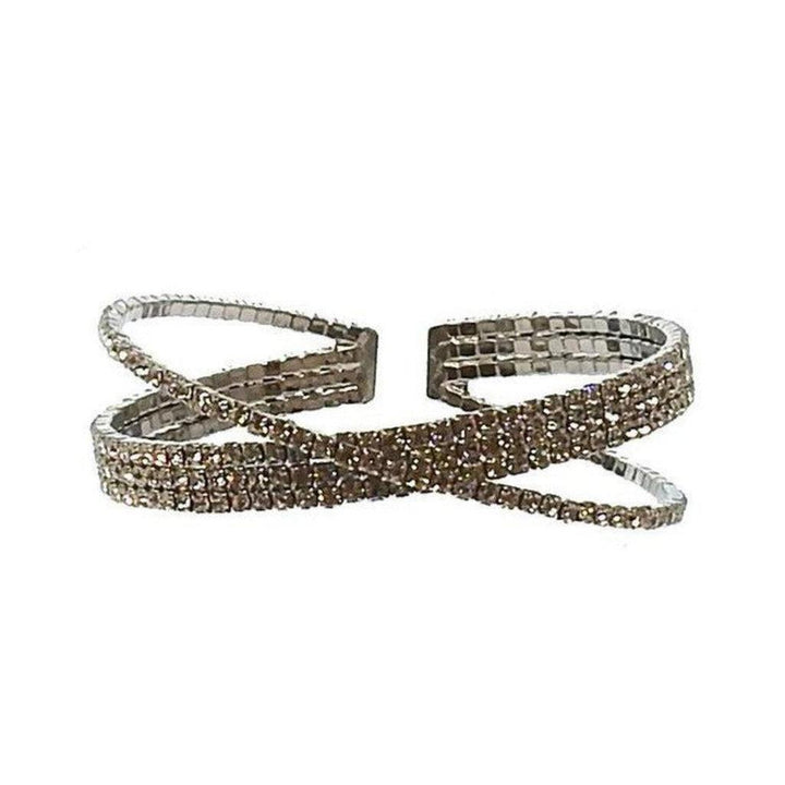 Silver 4-row crystal cuff bracelet with crisscross design.