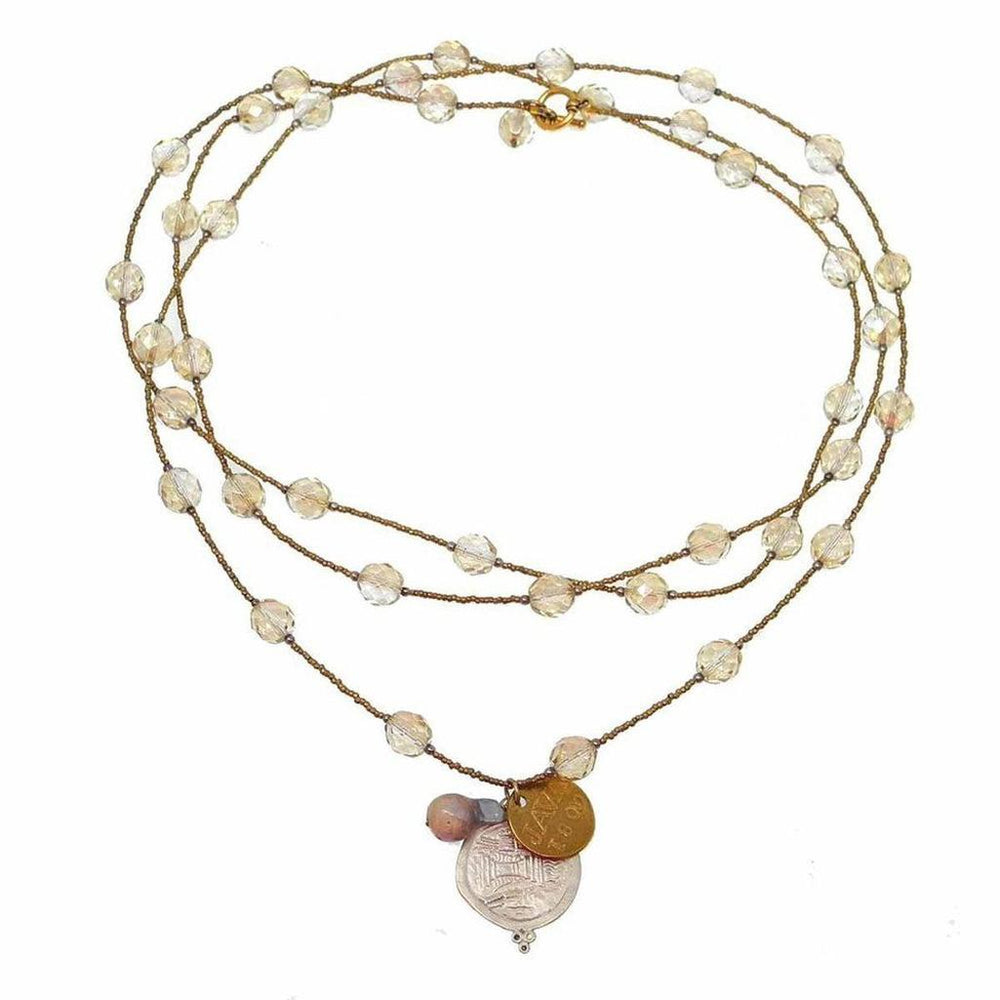 Layered citrine gemstone necklace, 60 inches long, with antique coin charm.