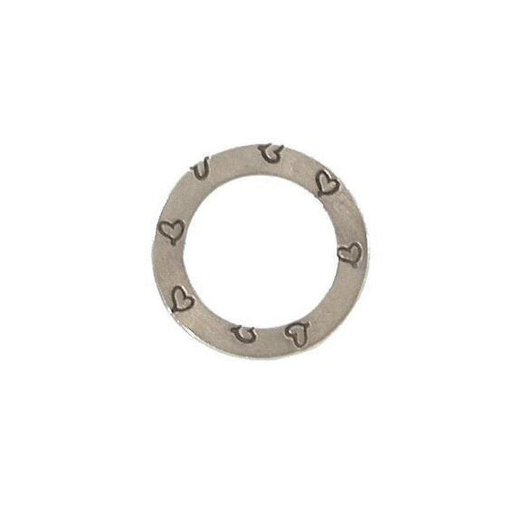 Silver charm featuring etched hearts, circular design.