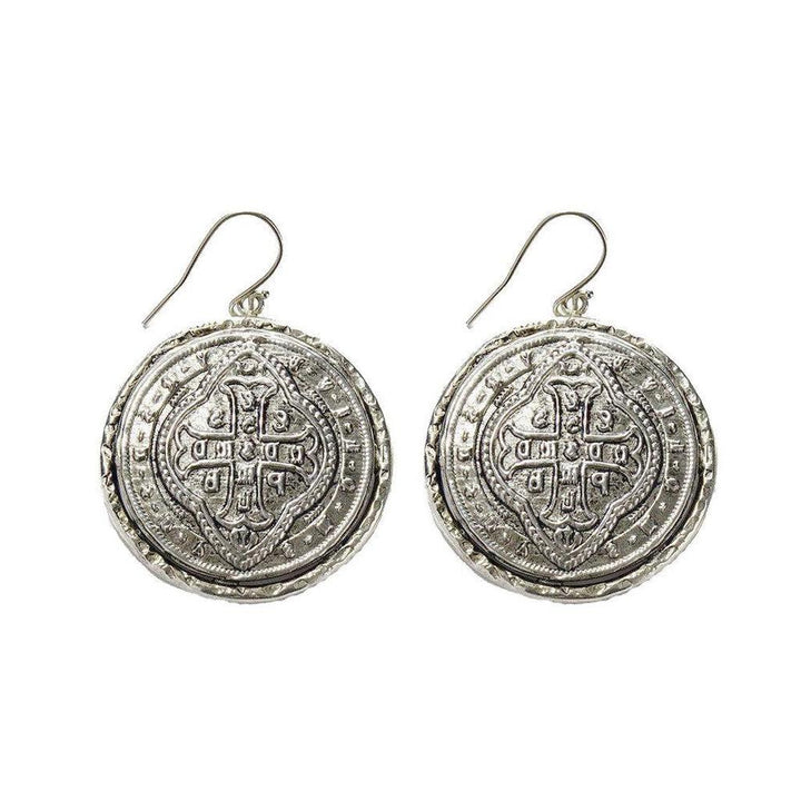 Alcazar silver coin hook earrings with ornate detailing.