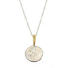 Angel in Flight necklace: silver coin pendant with engraved bird, gold accents & diamonds, delicate chain.