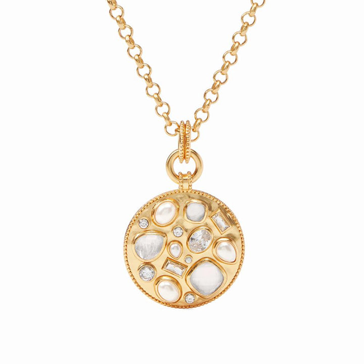 Gold chain necklace with a circular pendant featuring an assortment of white stones.
