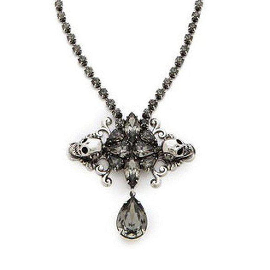 Auden Duval Pendant: Silver necklace with gray crystal skulls & teardrop pendant.