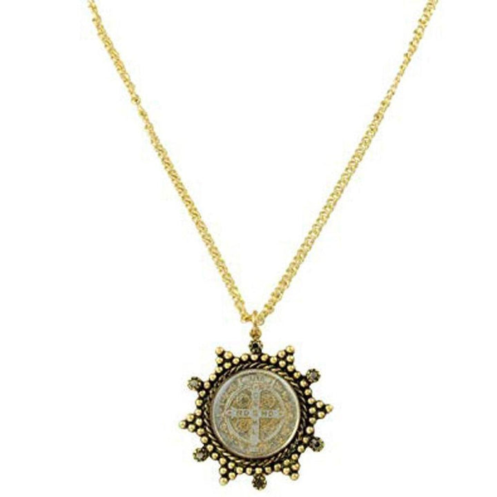 Gold chain necklace with antique-style medal pendant.