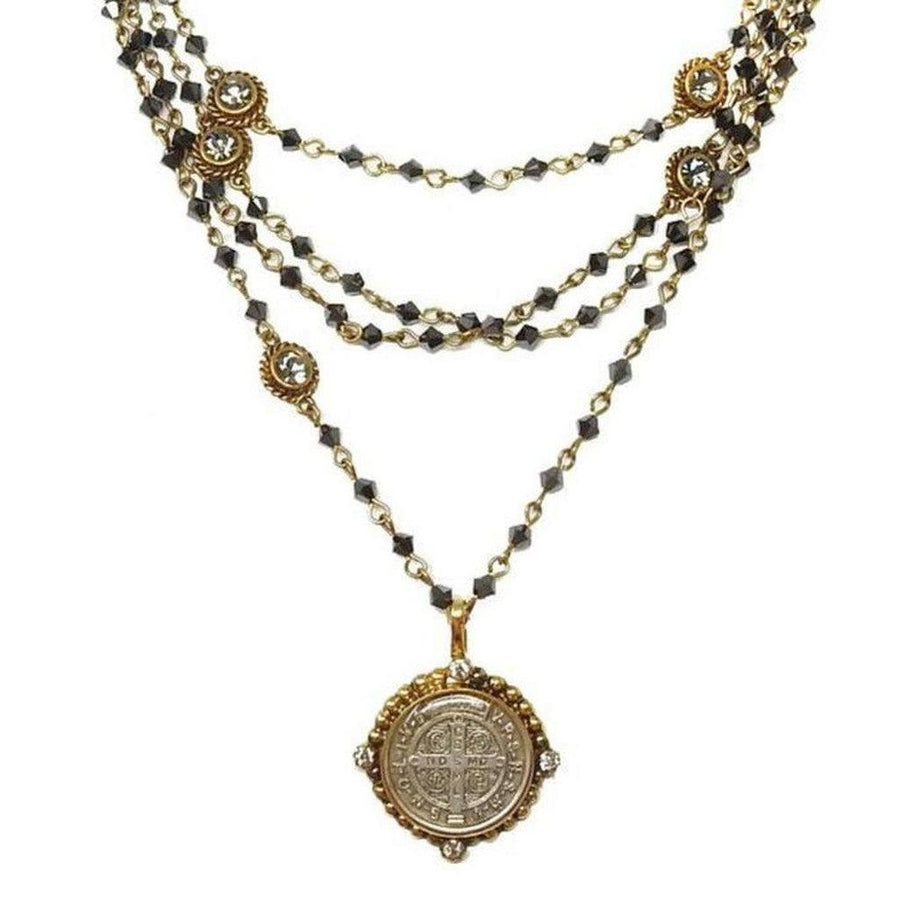 Bicone Magdalena Gold Hematite necklace: layered black hematite beads, gold accents & St. Jude medal.