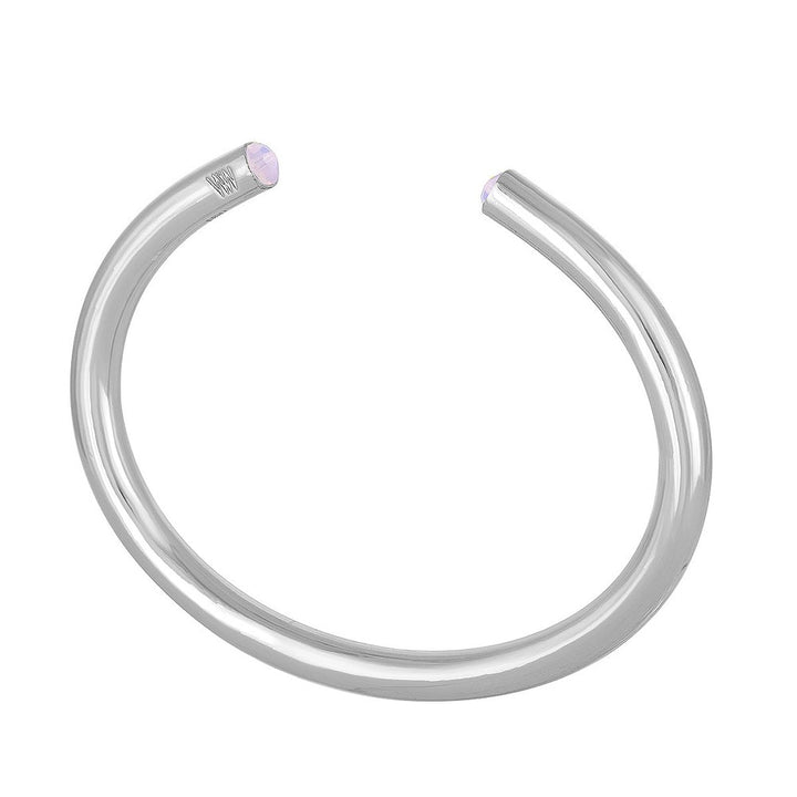 Silver bangle bracelet featuring pale pink opal accents.