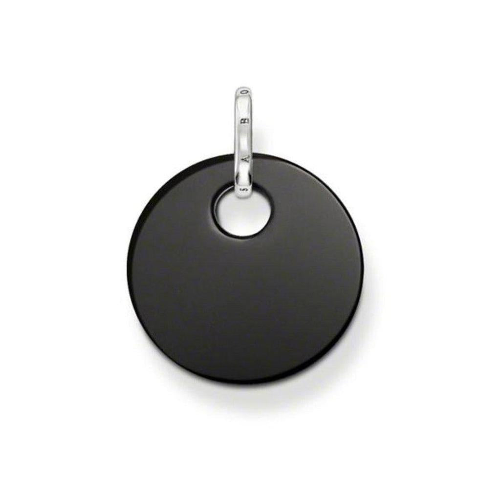 Black disc pendant with silver bail; minimalist jewelry.