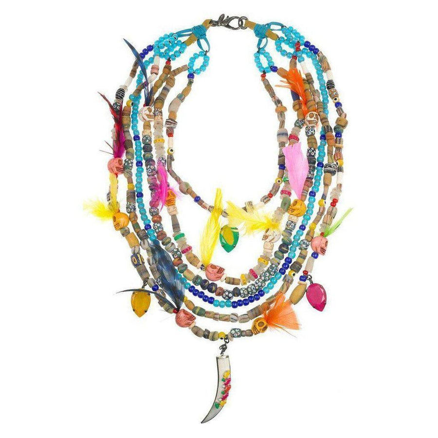 Multi-strand Black Magic necklace with colorful beads, feathers, and skull accents, featuring a unique tusk pendant.