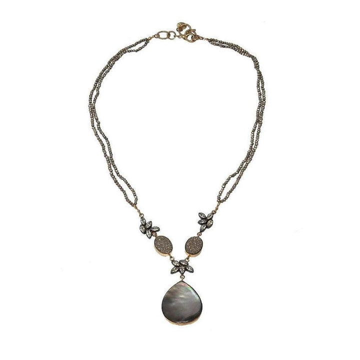 Elegant teardrop necklace with mother-of-pearl pendant and gray beaded chain.