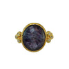 Oval blue sapphire ring in 18k gold with diamond accents