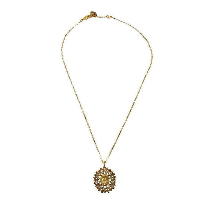 Gold necklace featuring a detailed medallion pendant against a white background.