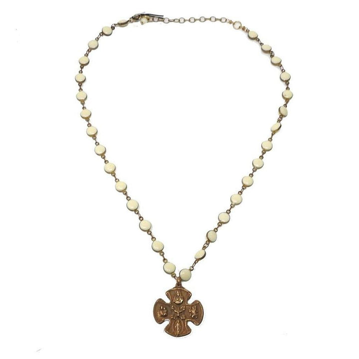 Bronze cross pendant necklace with creamy white beads.