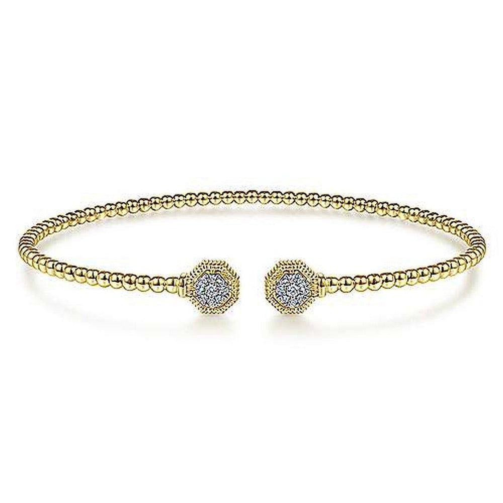 Gold beaded cuff bracelet featuring hexagon diamond accents.