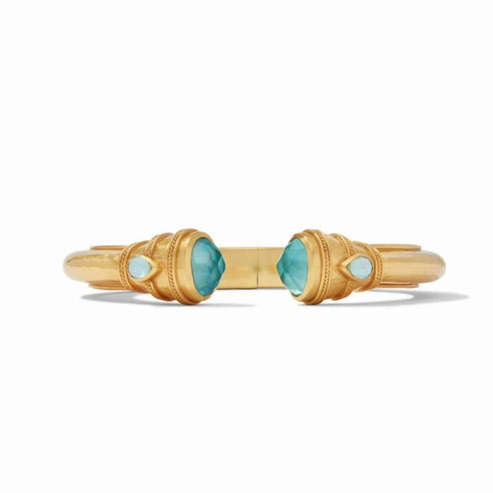 Gold cuff bracelet with turquoise and opal accents.