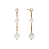 Cascade Pearl Earrings: Elegant gold chain drop earrings featuring three lustrous white pearls.