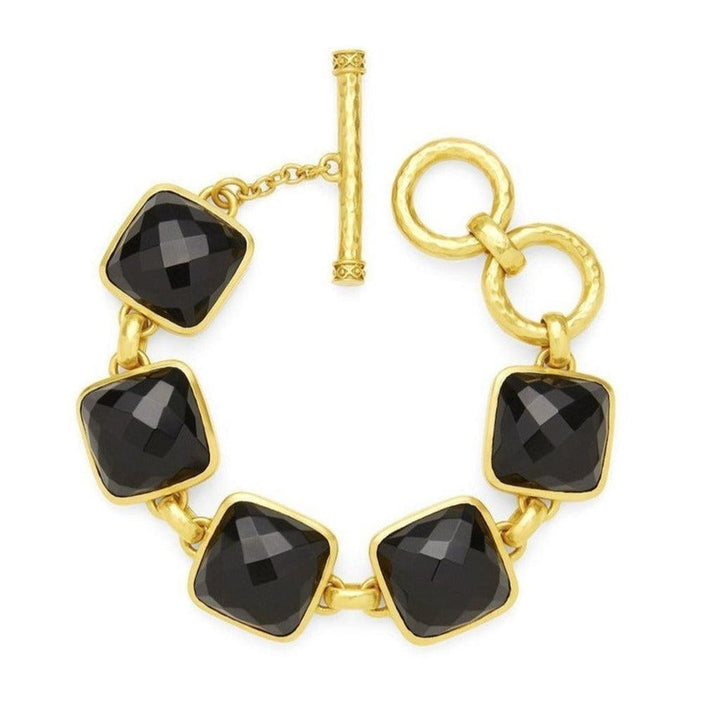 Gold link bracelet featuring black gemstone squares.