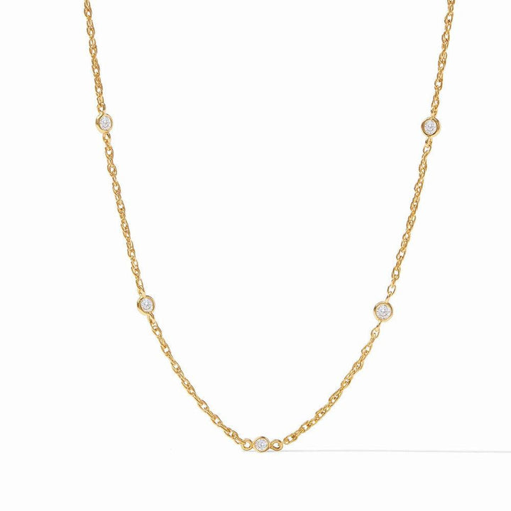 Celeste Delicate Station Necklace: Gold chain with five bezel-set diamonds.