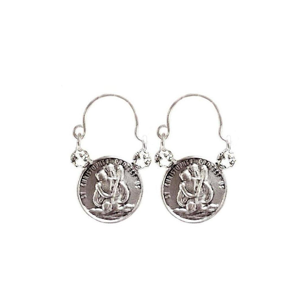 Silver hoop earrings featuring St. Christopher medallions and crystal accents.