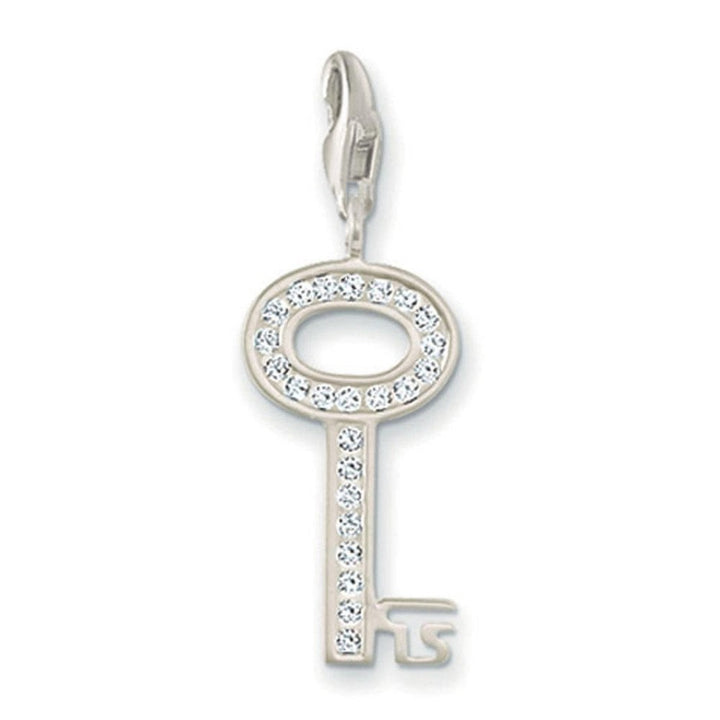 Charm 0010 Clear Zirconia Key charm, silver key pendant adorned with clear zirconia stones.