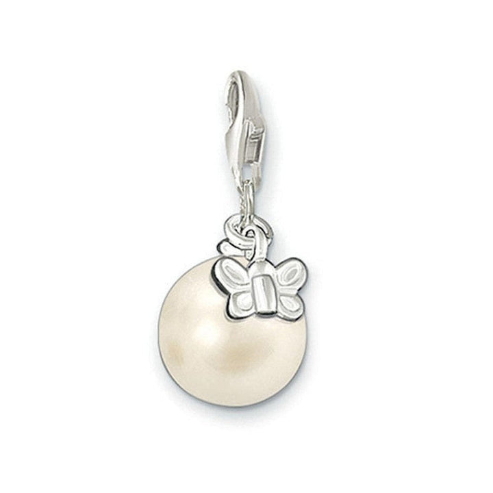 Cream pearl charm featuring a silver butterfly accent.
