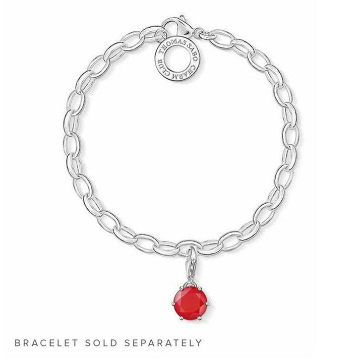 July birthstone charm, vibrant red gemstone pendant on a silver chain.