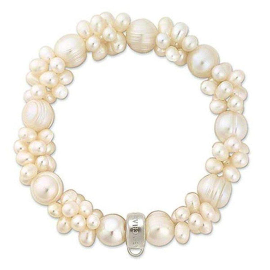 Elegant cream pearl charm bracelet with silver clasp
