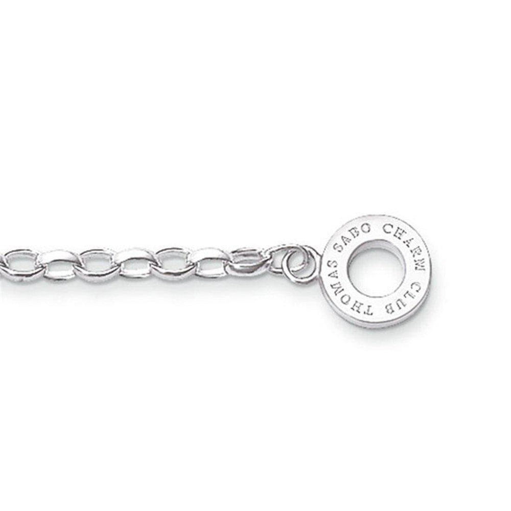 Silver charm bracelet with a chain link design and engraved circular charm.