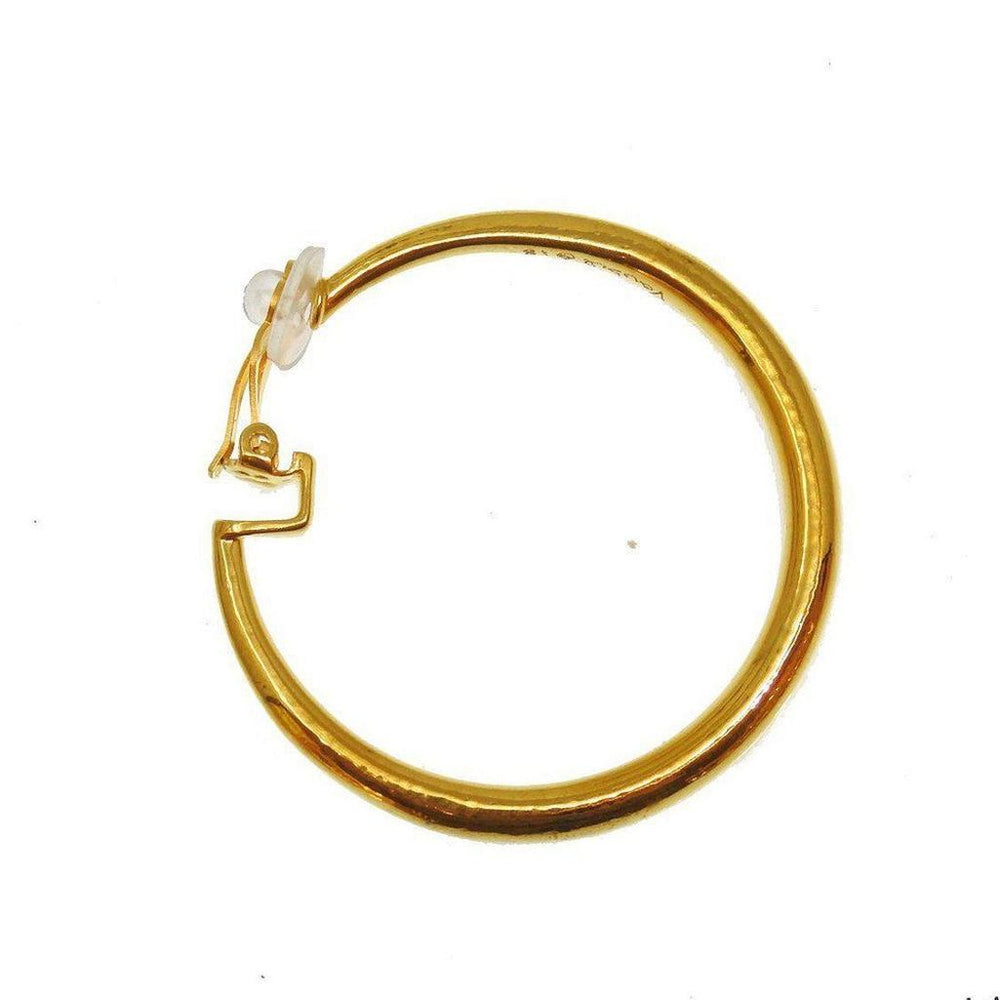 Gold clip-on hoop earrings;  classic round design.