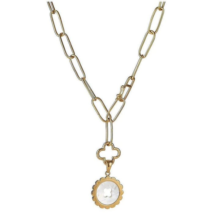 Gold chain necklace with clover charm and scalloped white stone pendant.