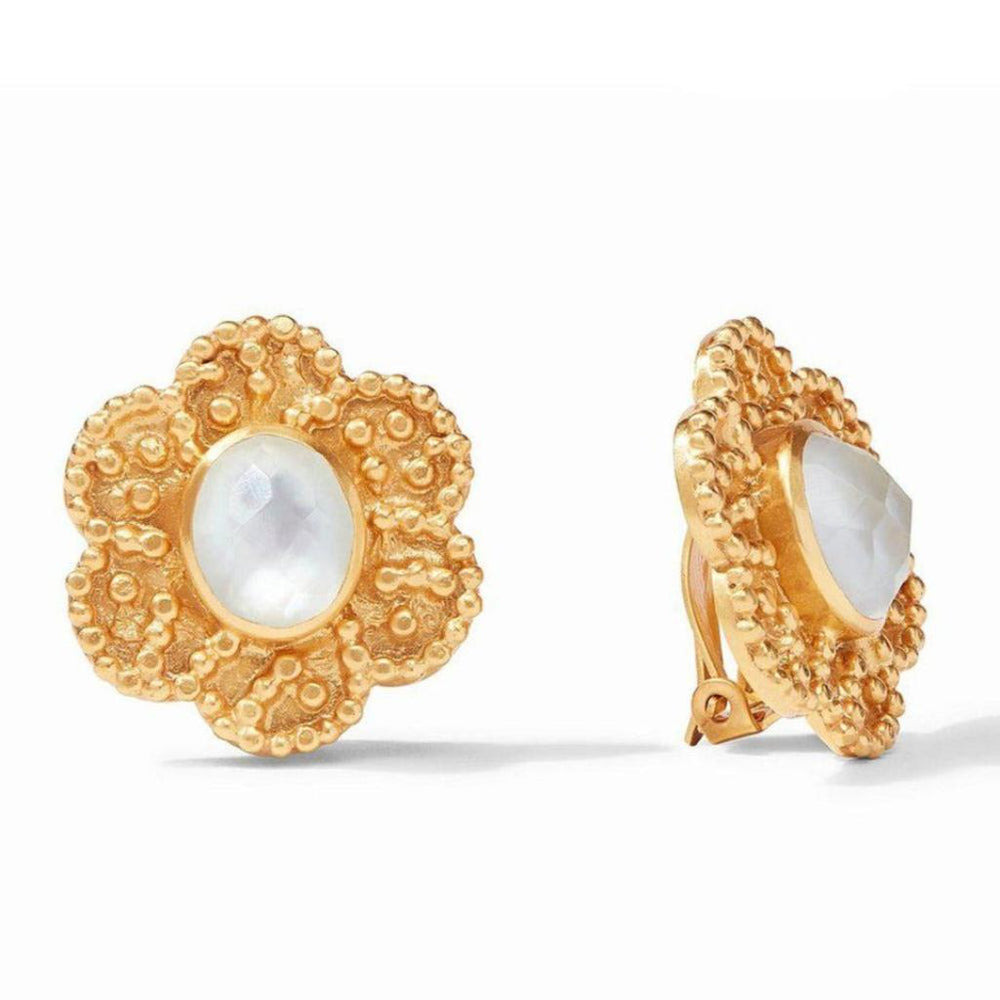 Gold flower-shaped clip-on earrings with a white stone center.