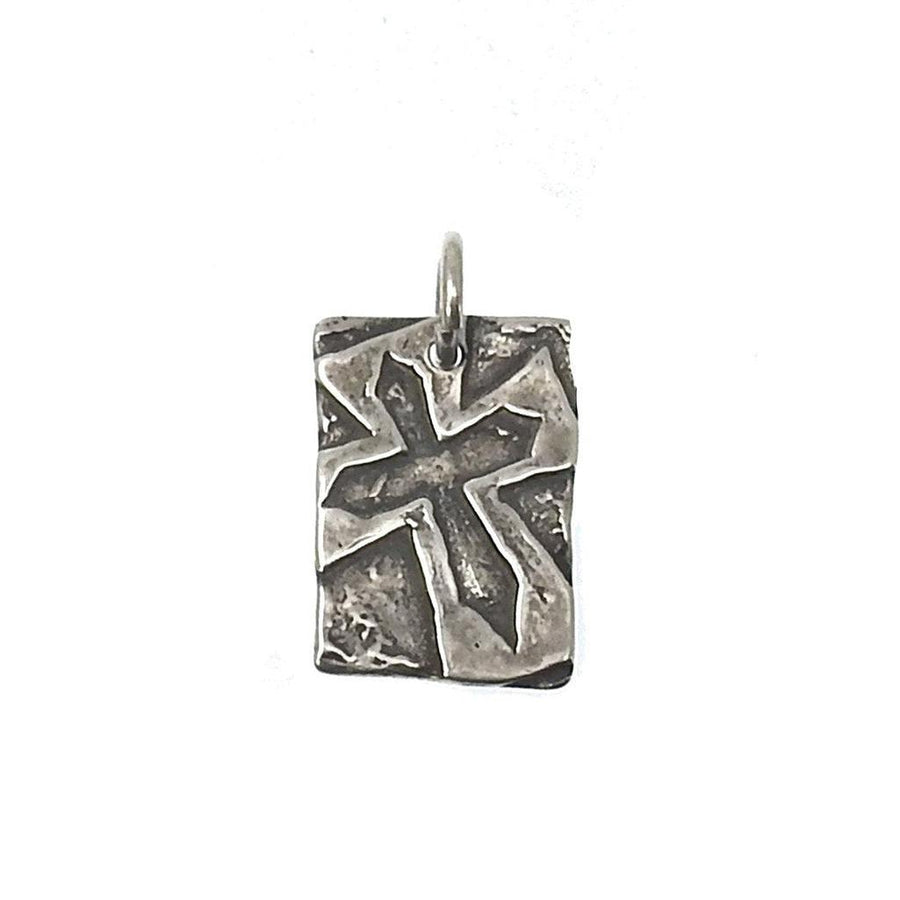 Silver cross pendant, rectangular, textured design.