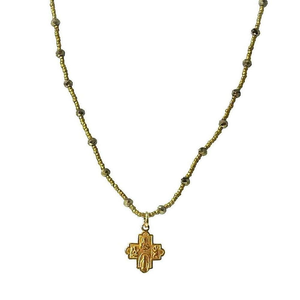 Gold cross pendant necklace on a pyrite beaded chain.