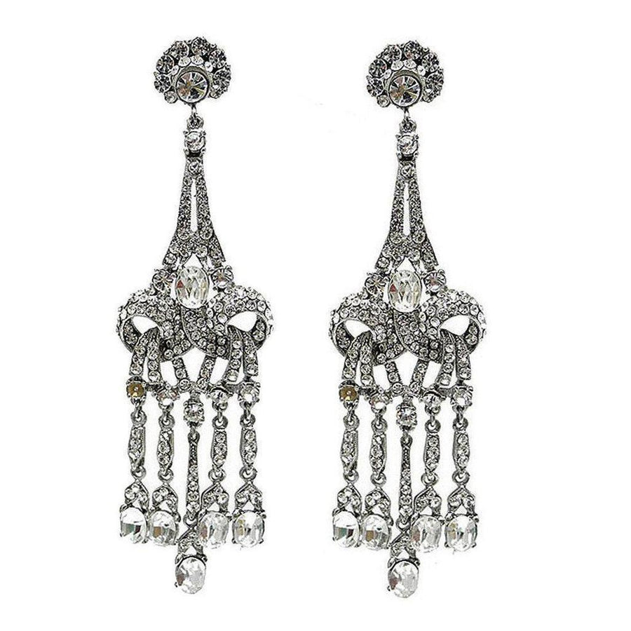 Crystal Chandelier Clip Earrings:  Silver-tone, crystal-encrusted chandelier design; elegant, statement earrings.