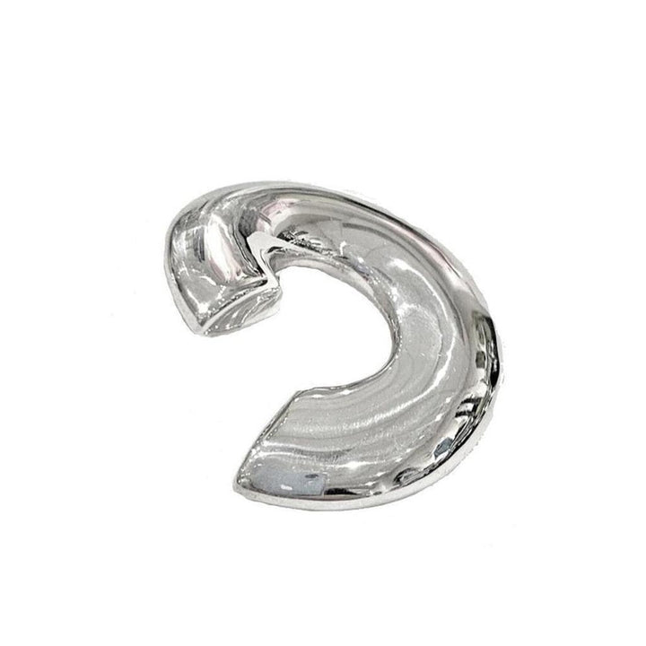 Silver abstract sphere earring with a curved, polished design.