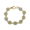 Grey Opal Cushion Cut Tennis Bracelet: Gold chain, light grey opal stones.