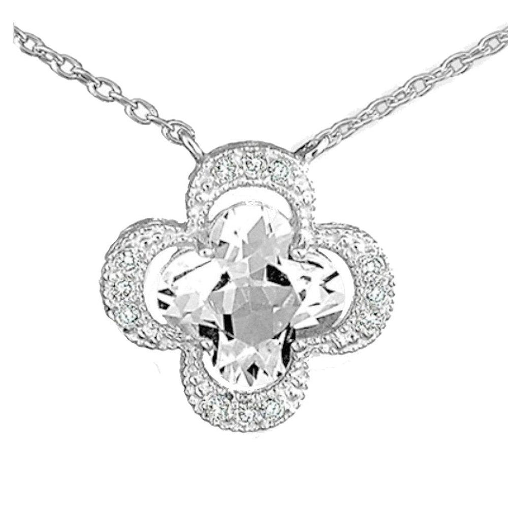 14k white gold clover pendant featuring a large white topaz and diamond accents.