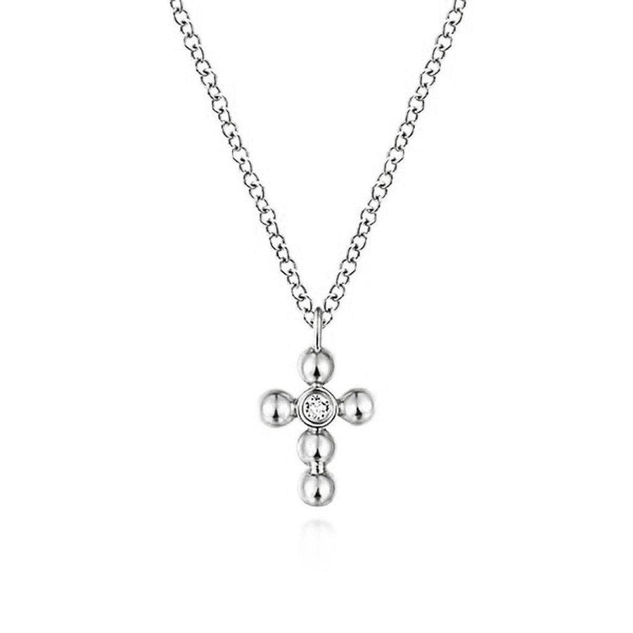 White gold diamond cross necklace with beaded detail.