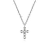 White gold diamond cross necklace with beaded detail.