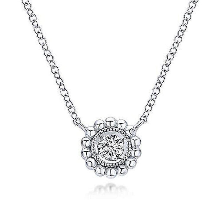 Elegant beaded diamond pendant necklace with solitaire center stone.