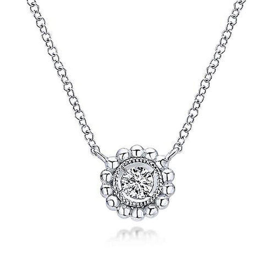 Elegant beaded diamond pendant necklace with solitaire center stone.