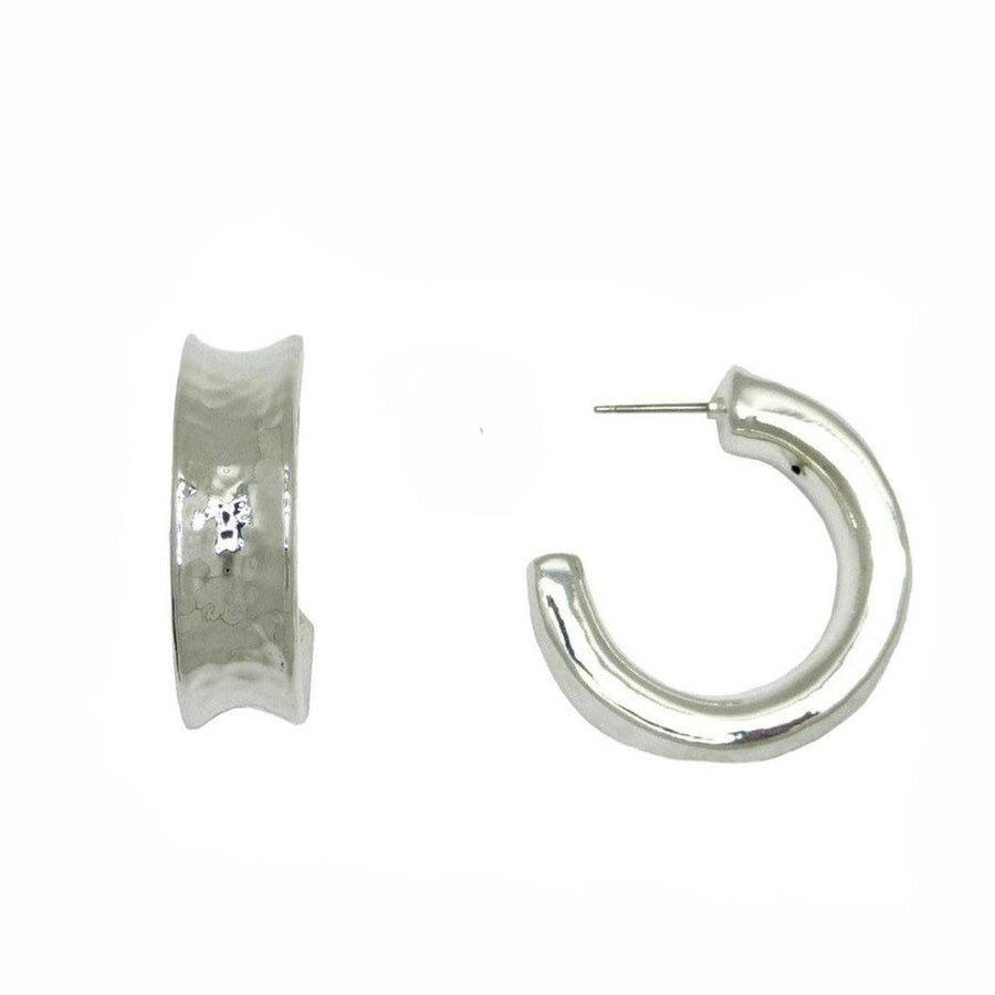 Silver indented hoop earrings; textured, modern design.