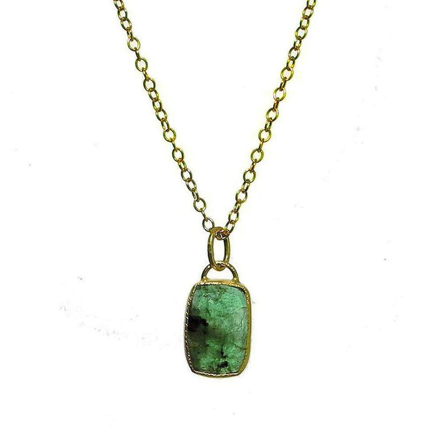 Emerald necklace with 18k gold chain and rectangular gemstone pendant.
