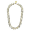 Gold Empowered Women necklace; bullet-shaped links, statement piece.