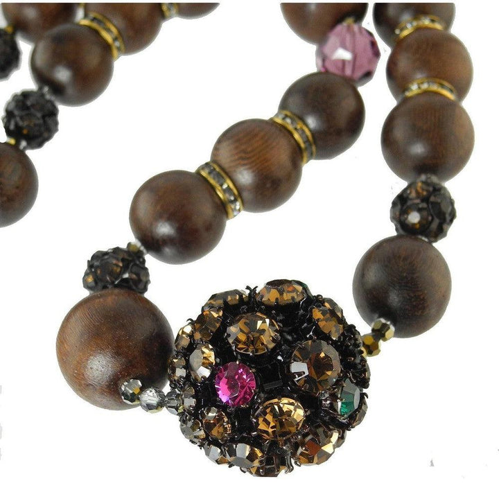 Dark brown wooden bead necklace adorned with sparkling crystal accents.