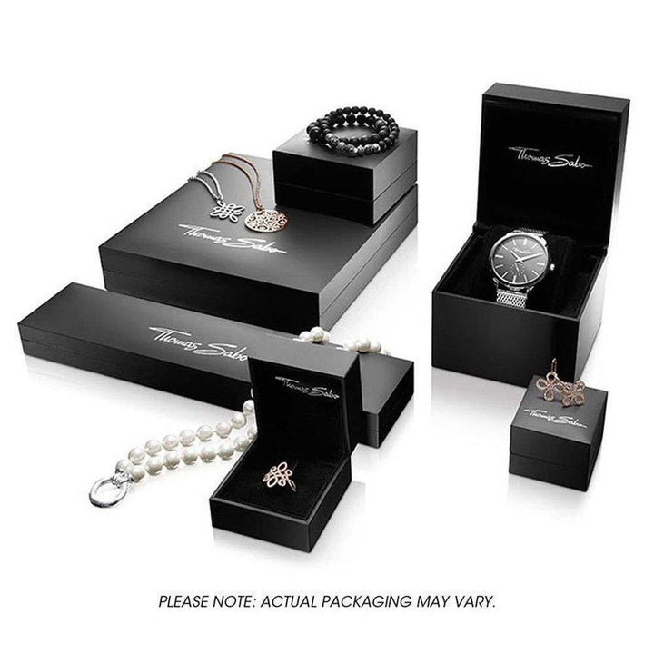 Elegant black jewelry boxes showcasing various pieces, including a bracelet, watch, necklace, and rings.