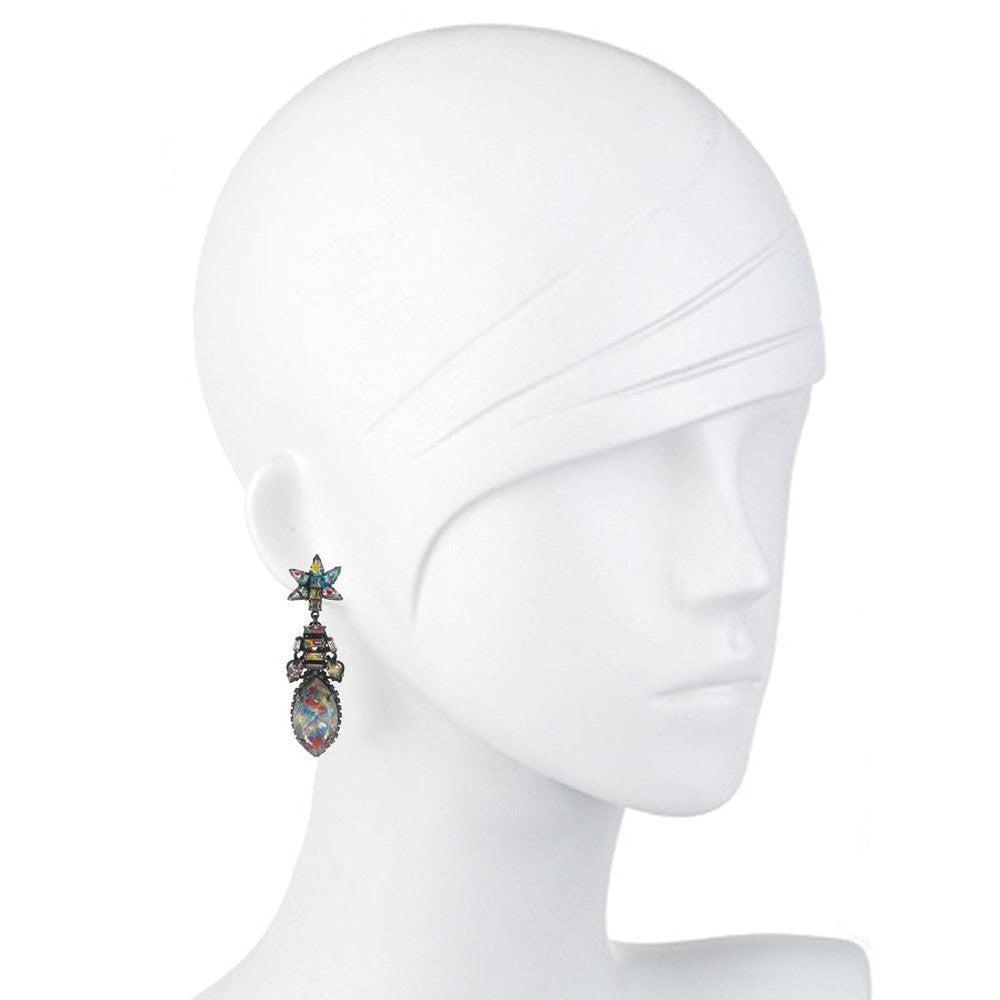 Colorful gemstone drop earrings with star accents, shown on a mannequin.