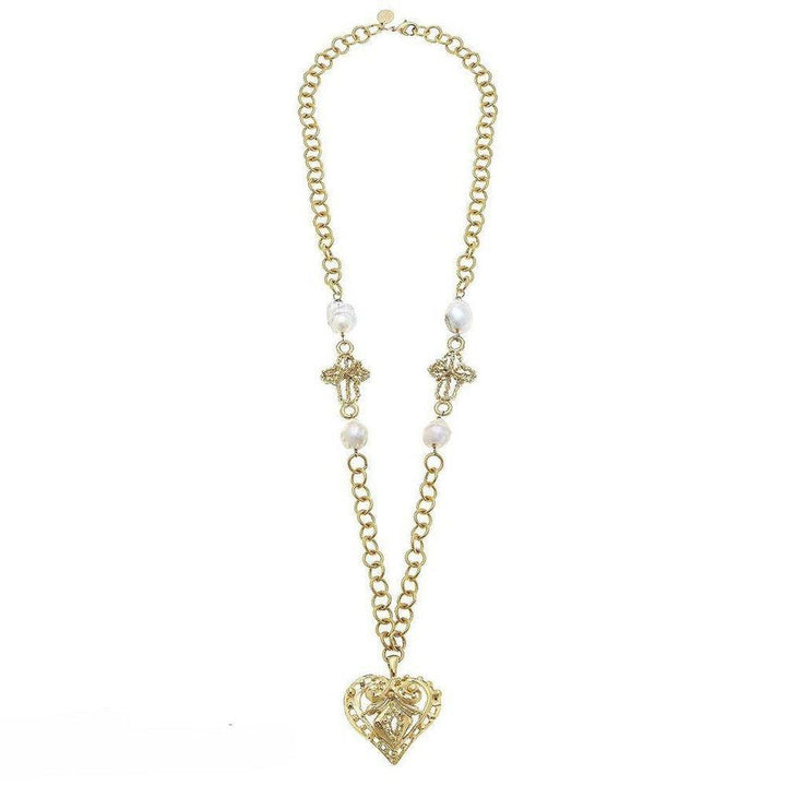 Gold chain necklace with filigree heart pendant and pearl accents.